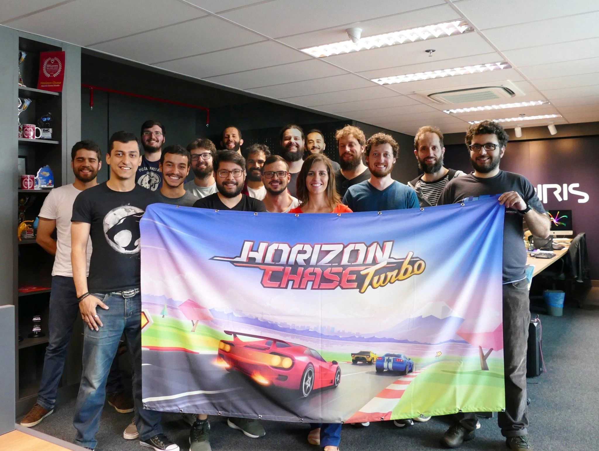 Team photo of the developers of the game Horizon Chase Turbo
